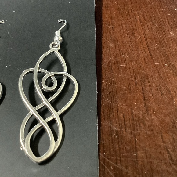 Elegant Silver Swirl Earrings - Picture 2 of 3